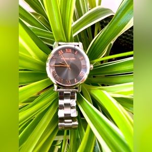 Silver and rose golden Micheal Kors watch